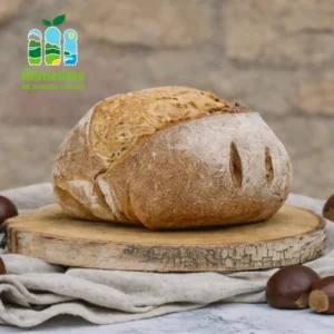 Pan Seronda sin gluten elaborado con harina de castaña asturiana sobre tabla de madera, con sello Alimentos del Paraíso Natural